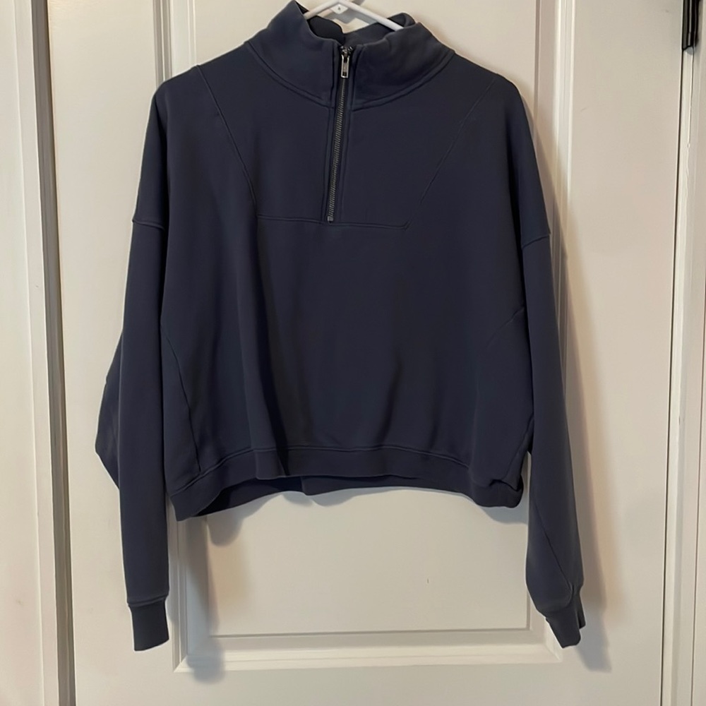 Grayish blue sweater, soft.